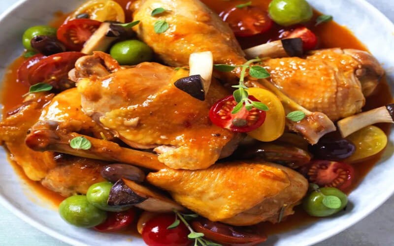 Recette de cuisses de poulet mijotées aux tomates cerises et champignons